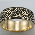 14 karat yellow gold band with &#34;triangles and squares&#34; celtic pattern.