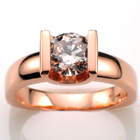 14 Karat Rose gold saddle ring with 1.34 ct. "top-light-pink" natural color diamond.