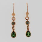 14 karat6 rose gold dangle earrings with round green diamonds and pear shaped green tourmalines.