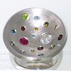 Palladium multi-colored dish ring with flush-set irradiated diamonds in a variety of sizes and colors