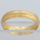 14 Karat Yellow Gold band with triple-millgrain and hand-engraved e-h pattern borders