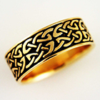 14 karat yellow gold celtic band with oval-shaped double-bendy knots.