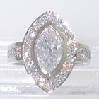 Platinum "Halo" ring with Marquise-shaped diamond surrounded by bead-set melee round diamonds with bead-set round melee diamonds on cathedral shank (alternate view)