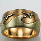 14 karat multi-colored gold band with ocean theme in brushed finish.