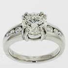Platinum ring with 3 ct round brilliant diamond in 8-prong gallery setting on tapered channel shank
