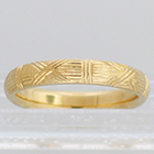 14 Karat Yellow Gold hand-engraved band with woven pattern