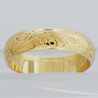14 Karat Yellow Gold hand-engraved band with acorns and oak leaves pattern