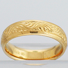 14 Karat Yellow Gold hand-engraved band with "wriggles" pattern