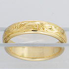 14 Karat Yellow Gold half-round band with western hand-engraved pattern