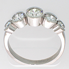 Platinum 5-stone ring with round brilliant diamonds in bezels