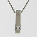 Platinum square bar pendant with flush-set princess-cut diamond.