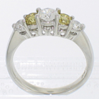 Platinum 5-stone ring with white and canary-yellow round brilliant diamonds in 4-prong gallery settings