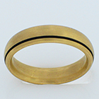 14 karat yellow gold brushed comfort-fit band with offset blackened lathe line.