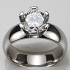 Palladium ring with 1.5 ct. round brilliant diamond set in platinum hand-cut six-prong head on heavy duty palladium shank.