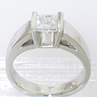 platinum square-saddle ring with channel-set princess-cut diamond in view-through shank