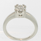 14 Karat White Gold solitaire with 0.80 carat round brilliant diamond in 8-prong fishtail-style fancy head