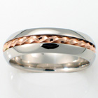 Palladium band with 14 Karat Rose gold twisted wire inlay.