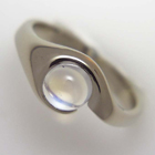 freeform moonstone ring in 14 karat white gold.