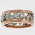 Platinum diamond band with multiple shapes of diamonds in bezels set between 14 karat rose gold square bands.