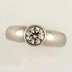 platinum bezel-set round diamond ring