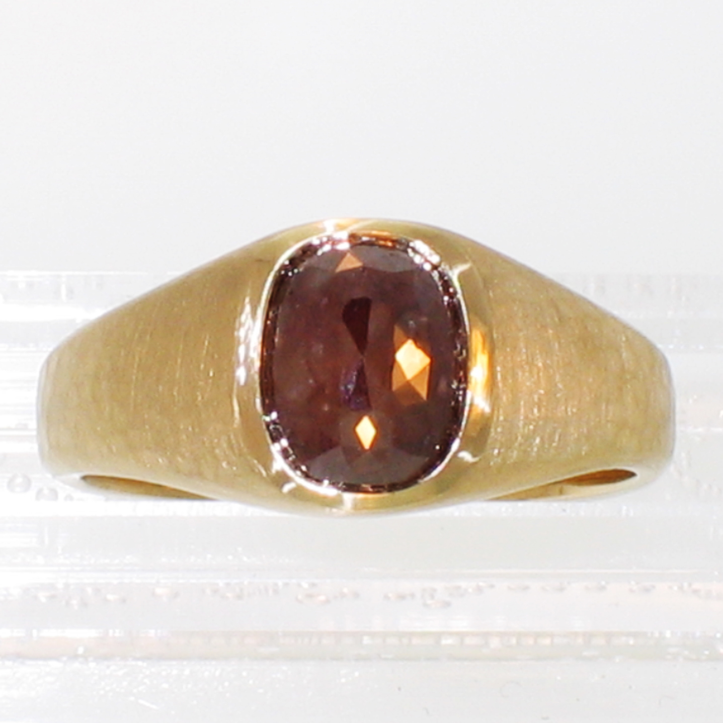 14 Karat Yellow gold hammered ring with lens-cut Matrix Diamond in polished bezel