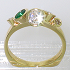 14 Karat Yellow Gold multi-bezels ring with Emeralds and Diamonds set all "willy-nilly" in conical bezels (alternate view)