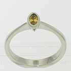 Platinum "stacker" solitaire ring with marquise-cut natural cognac-colored diamond in full bezel setting