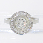 Platinum diamond ring with 1 carat round brilliant diamond in "halo" setting with round brilliant melee diamonds bead-set on halo plate (alternate view)