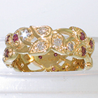 14 Karat Yellow Gold Leafy band with bead-set purple and white diamonds