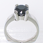 Palladium solitaire ring with Black Diamond in heavy 4-prong setting