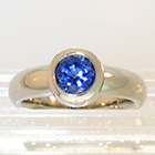 14 Karat White Gold Sapphire bezel-set Solitaire ring