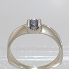 14 Karat Yellow Gold Oval-shaped Alexandrite in Square "Saddle" setting