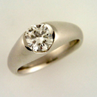platinum diamond ring with v-shaped channel-set flush saddle ring (no lip)