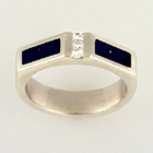 platinum vertical-channel ring with 3 princess-cut white diamonds and 2 black jade inlays